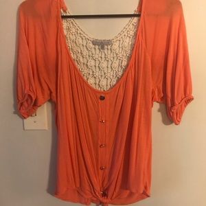 Orange lace back blouse